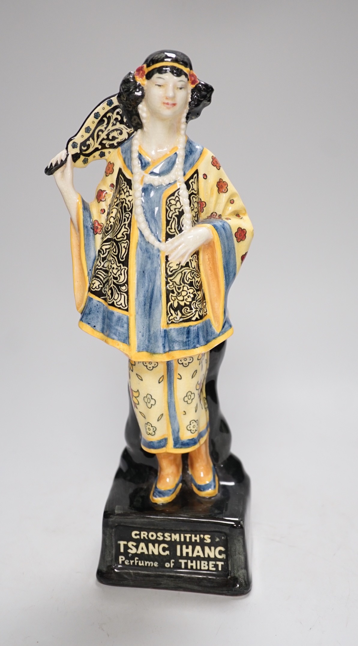 A Royal Doulton advertising figure 'Grossmith’s Tsang Ihang perfume of Tibet', 30cm high